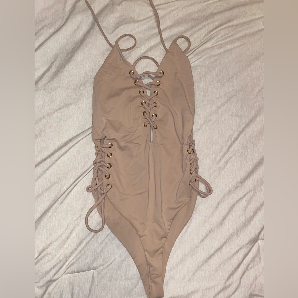 Nude body suit